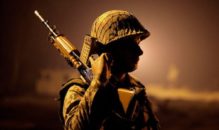 an-indian-soldier-stands-010